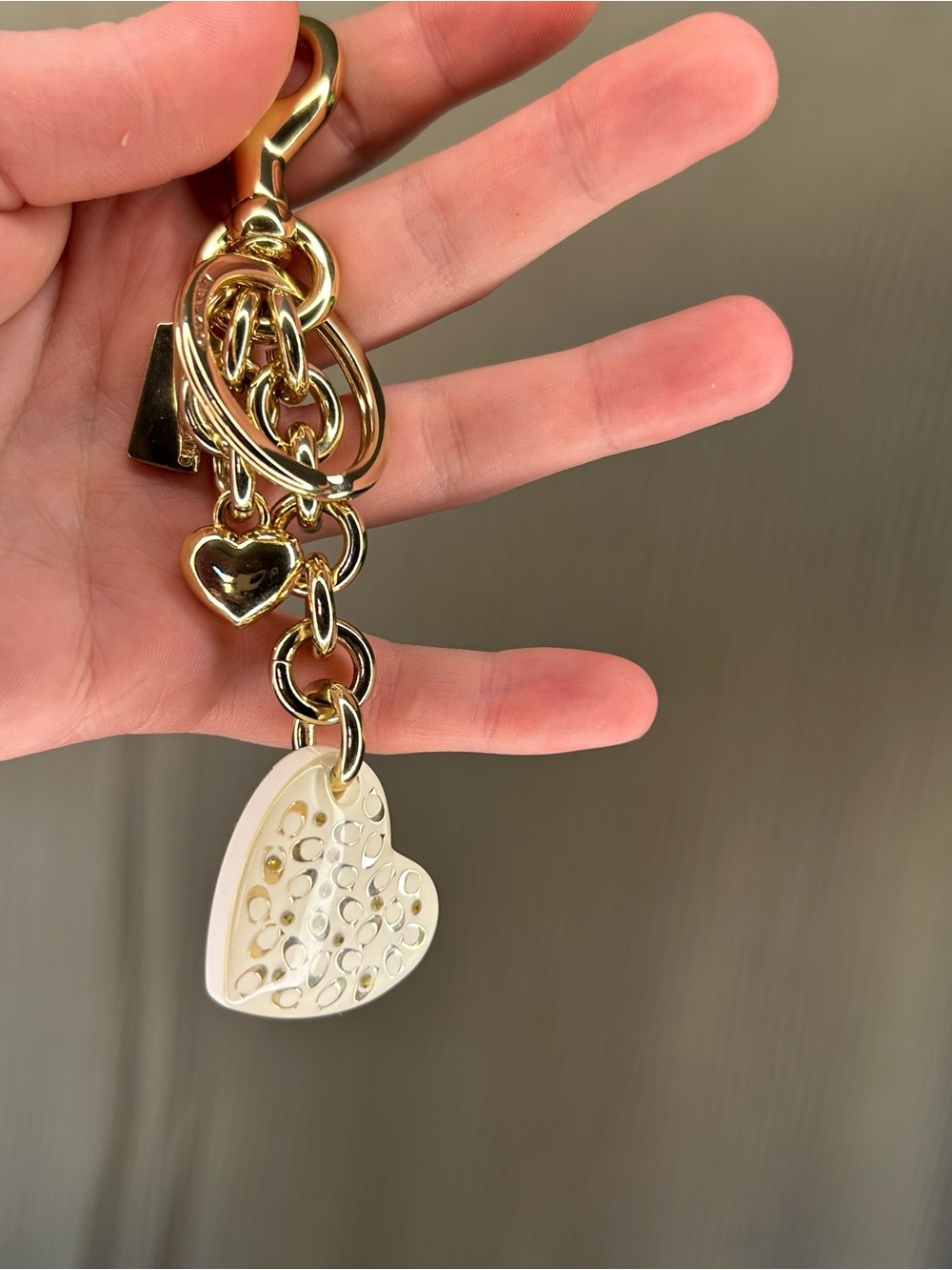 Coach Gold-Tone Heart Charm Keychain with White Heart Pendant